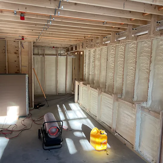 Spray foam insulation in progress